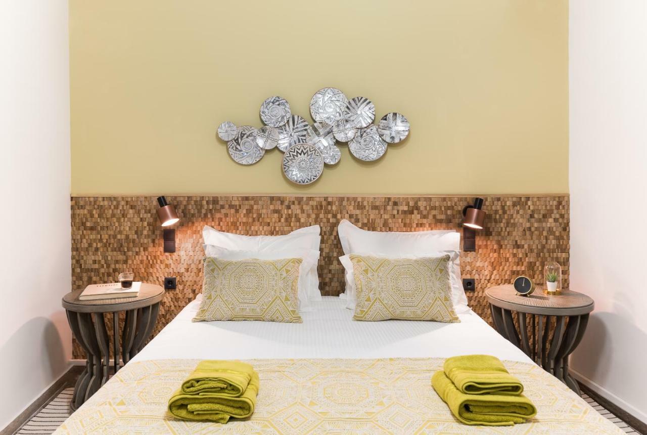 Mavrogenous Luxury Apartments นาฟปลิโอ ภายนอก รูปภาพ